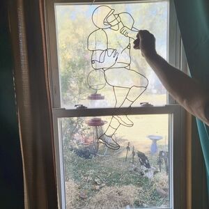 Wire silhouette football player.